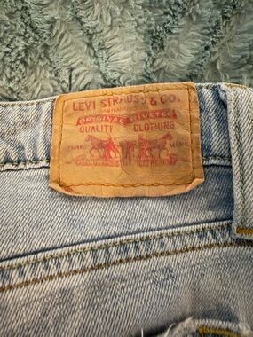 Levi's Men's Light Blue Denim Jeans with Tan Leather Patch